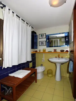 a bathroom with a sink and a toilet at Angelo Emo Terrace in Rome