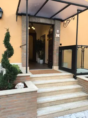 a front door of a house with a set of stairs at Villa Matissa in Rome