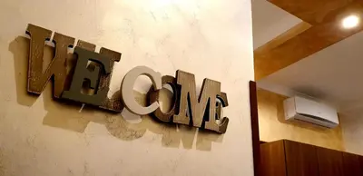 a sign on a wall that reads new camp at Jadore Monic in Rome
