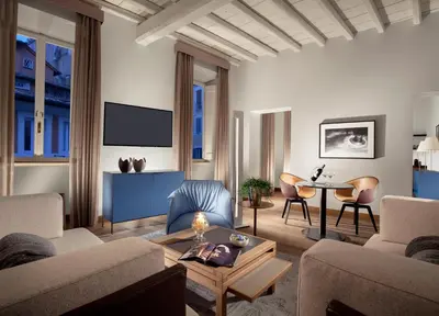 a living room with a couch and a table at Palazzo Scanderbeg in Rome