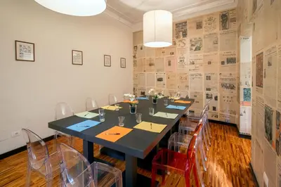 a dining room with a long table and chairs at Suitedreams in Rome