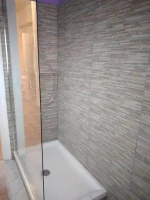 a shower with a glass door in a bathroom at Dal Pontefice in Rome