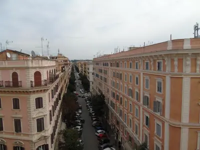 an aerial view of a city street with buildings at Room Inn Vatican in Rome