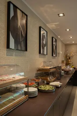 a buffet line with many different types of food at Hotel Villa Maria Regina in Rome