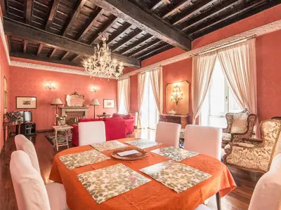 a dining room with a table and chairs at Apartment Spanish Steps by Interhome in Rome