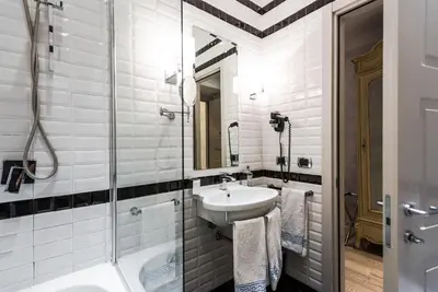 a bathroom with a sink and a shower at MDM Guesthouse in Rome
