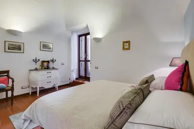 a bathroom with a toilet and a sink at Purificazione 44 Guest House in Rome
