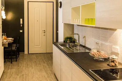 a kitchen with a sink and a counter top at The Green Corner in Rome