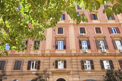 a large building with many windows on it at Colonna Luxury Suites in Rome