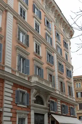 a large brick building with a lot of windows at Vatican Plaza in Rome