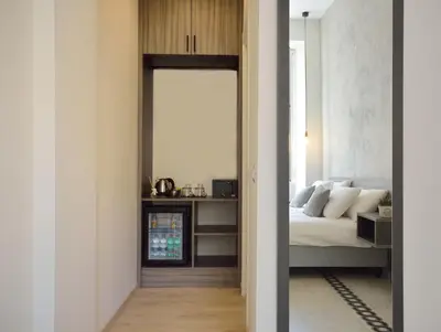 a bedroom with a bed and a mirror at Room with a view 105 in Rome