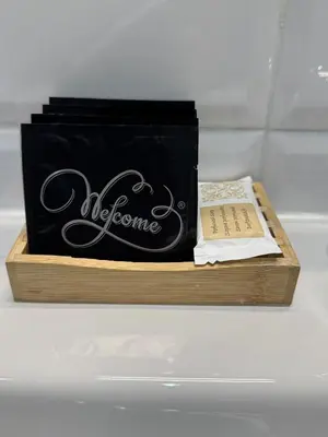 a black box with a book on a table at Flaminio Holidays in Rome