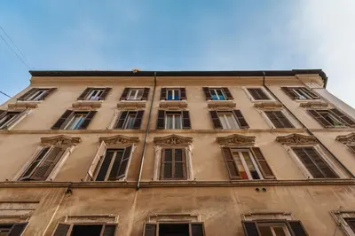 a tall building with many windows on top of it at DC Collection Spagna in Rome