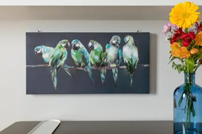 a painting of seven birds sitting on a branch at Rome as you feel - Grotta Pinta apartments in Rome