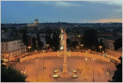a large plaza with a monument in the middle of a city at Ciao Bella Stella in Rome