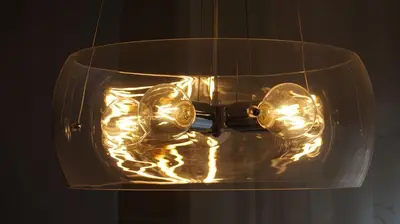 a glass vase with a light inside of it at Franca's Home in Rome