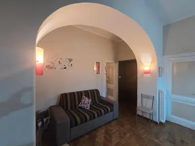 a bedroom with a bed with two stuffed animals on it at Casa Tua a Porta Maggiore in Rome