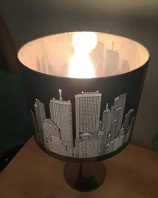 a lamp with a picture of a city on it at Sweet Roman Dream in Rome