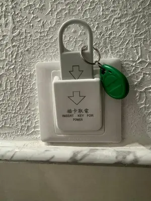 a padlock with a green mouse on a shelf at LUXOR ECO ROMA CASA E APPARTAMENTO PER VACANZE IN CENTRO Piazza Bologna, Colosseo, Piazza di Spagna, Vaticano, San Pietro, Sapienza, Fontana di Trevi, Piazza Navona, Trastevere, Tiburtina, Termini, Aeroporto in Rome