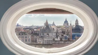 a view of a city through a window at Rental in Rome Flaminio View Suite in Rome