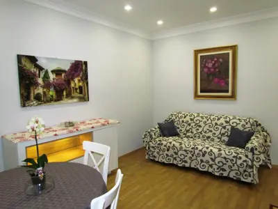 a living room with a couch and a table at Latere Vatican Loft in Rome