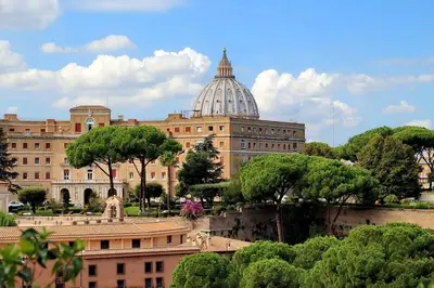 a large building with a dome on top of it at Sant'Onofrio Terrace Apartment in Rome