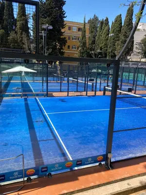 a tennis court with a net on top of it at LH Hotel Excel Roma Montemario in Rome