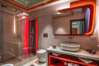 a bathroom with a sink and a shower at Via Veneto Prestige Rooms in Rome