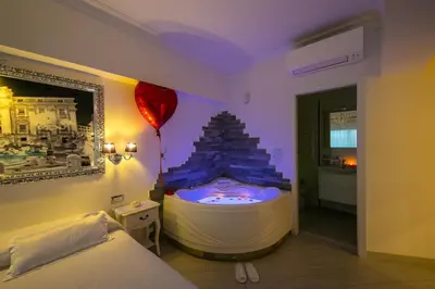 a room with a tub with a balloon in it at Suites Roma Tiburtina Elegance in Rome
