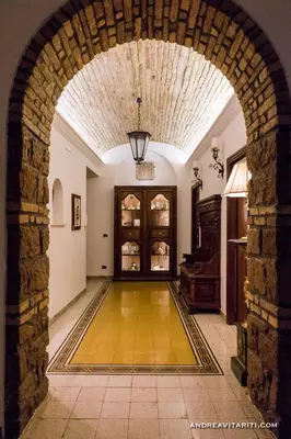 an arched hallway with an archway in a house at Central Domus Roma in Rome