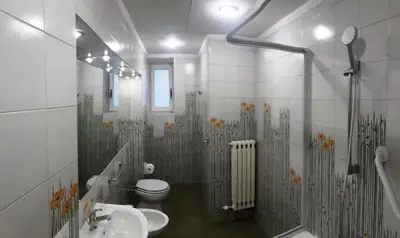 a bathroom with a sink and a toilet in it at CiaoRoma! in Rome