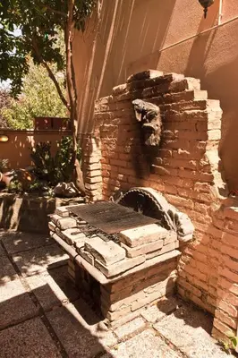 an outdoor brick oven on the side of a house at Casale 2.0 in Rome