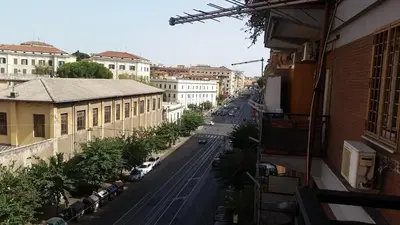 a view of a city street with buildings and cars at Filiberto Apartment in Rome