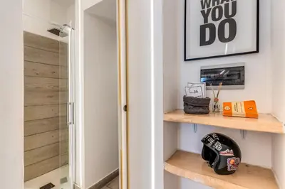 a room with a closet with a glass door at Costaguti 36 Apartment in Rome