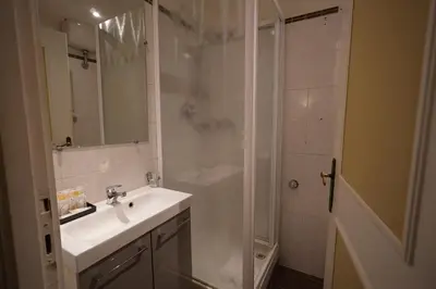 a bathroom with a sink and a shower at MGPgroup Guest House Navona 2 in Rome