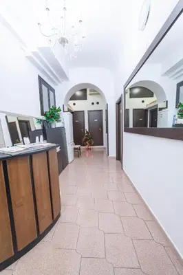 a hallway of a salon with a counter at Lemei House in Rome