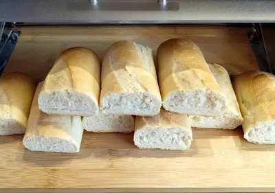 a group of loaves of bread on a cutting board at J24 B&B in Rome