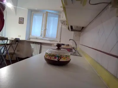 a pot sitting on top of a counter in a kitchen at La Casa di Nonna Betta in Rome