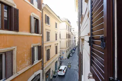 a view of an alley with a car parked on the street at Navona Hi-Tech Apartment in Rome