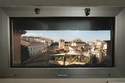 a view of a city from a window at La Mia Casa in Campo di Fiori in Rome