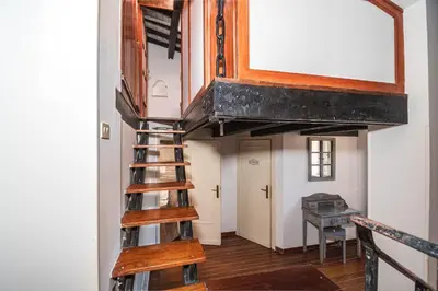 a stairwell in a room with a loft at Casa Trasteverina in Rome