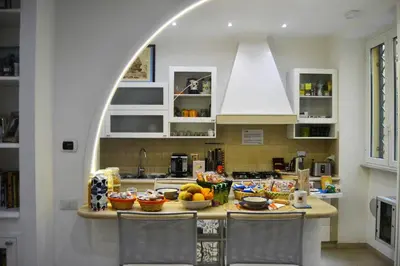 a kitchen with a counter with food on it at Roma Borgo91 in Rome