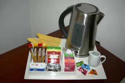 a tray with food and a coffee pot on a table at Roma Borgo91 in Rome