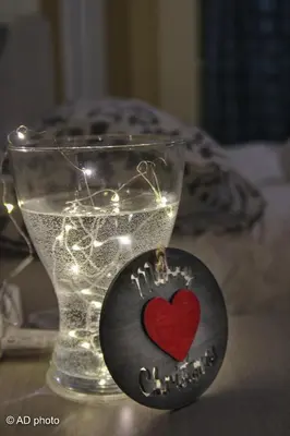 a plate with a heart on it next to a glass at Homesuitehome in Rome