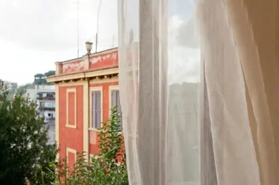 a view of a building from a window at Brancaleone86 - The Loft in Rome