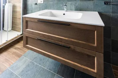a bathroom with a sink and a shower at Sapienza Apartment by RHR in Rome