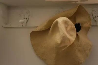 a curtain hanging on a wall with a shelf at S.Angelo Terrace sq Navona in Rome