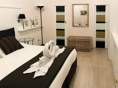 a hotel room with a bed with a towel on it at Vittoriano Suite in Rome