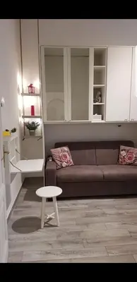a living room with a couch and a table at Rome sweet home in Rome