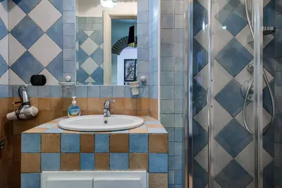 a bathroom with a sink and a shower at Mammamia in Rome